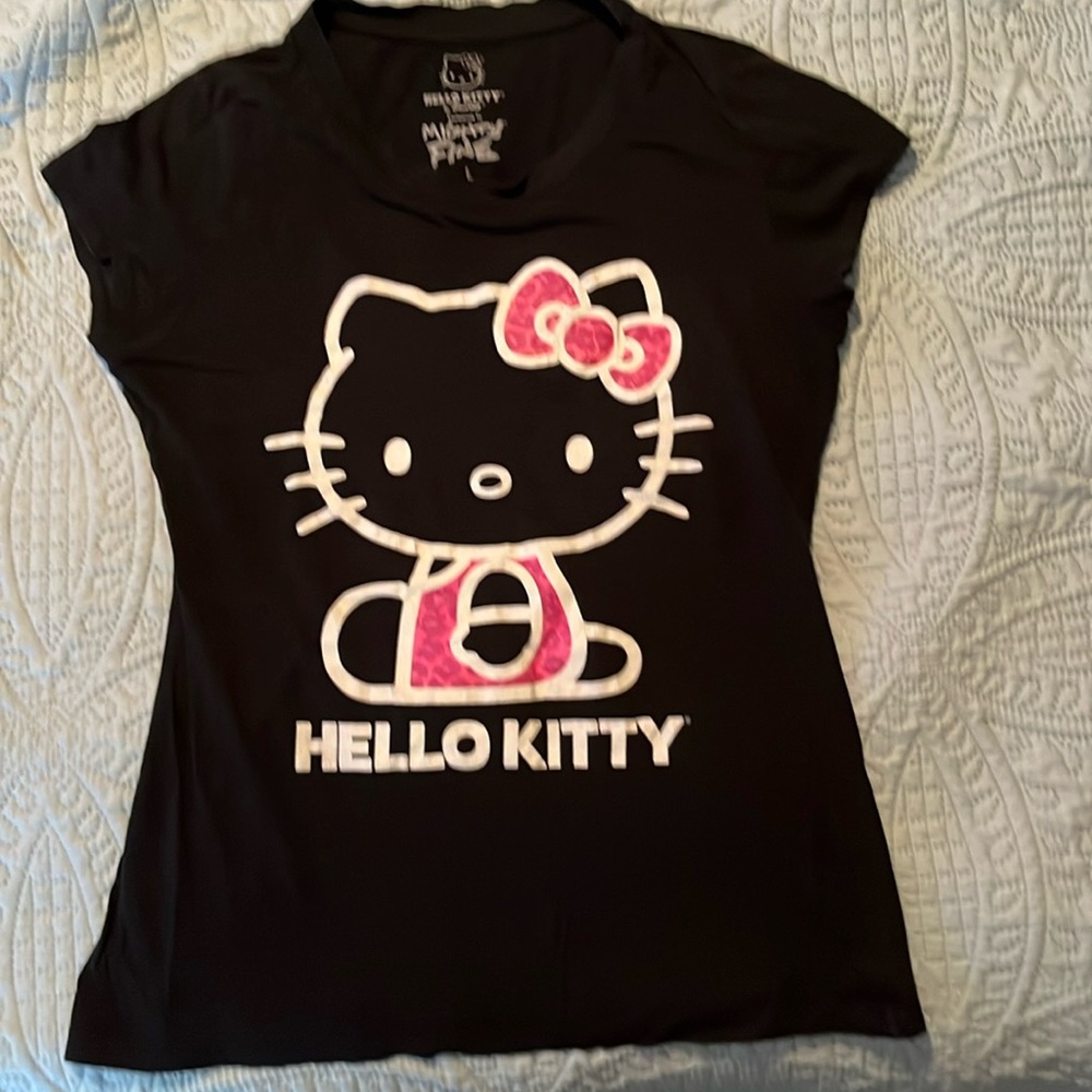 Sanrio black T-shirt. The size is listed as a large it fits like a medium.